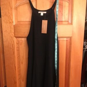 Francesca’s Black sun dress.